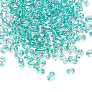 Seed bead, Preciosa Twin™ Czech glass, pkg/250g, 5x2.5mm oval, transparent green terra color-lined clear, (38658).