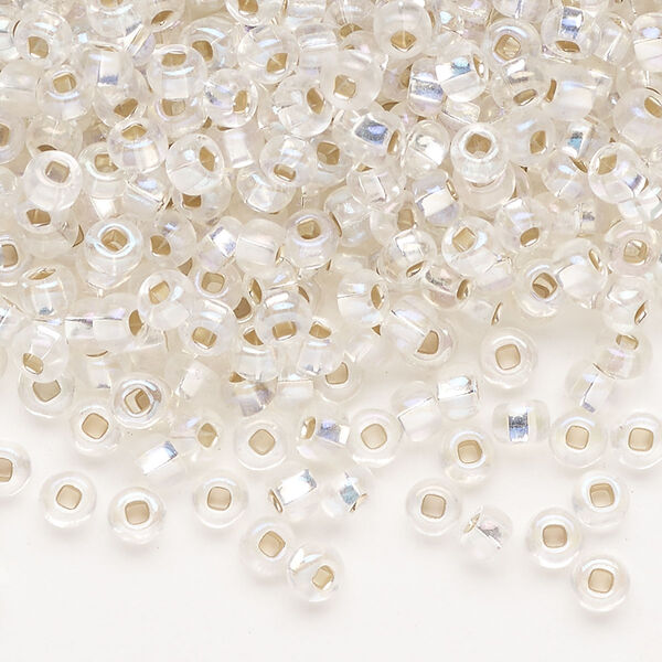 Seed bead, Preciosa Ornela Czech glass, pkg/50g, #6 rocaille, translucent silver-lined rainbow clear, (78109). image number 0