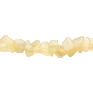 Bead, glass, translucent pale orange, small to large chip. Sold per 32-inch strand.