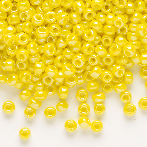 Seed bead, Dyna-Mites™, glass, opaque rainbow yellow, #6 round. Sold per 40-gram pkg. image number 0