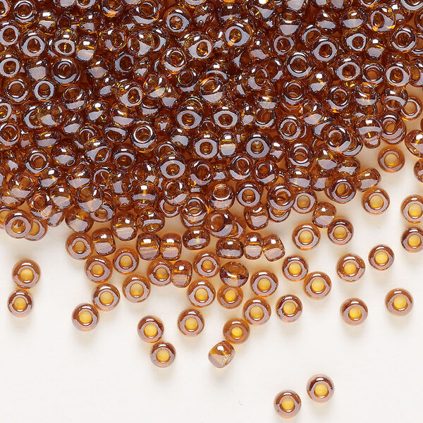 Seed bead, Preciosa Ornela Czech glass, pkg/50g, #8 rocaille, translucent luster topaz, (16090). image number 0