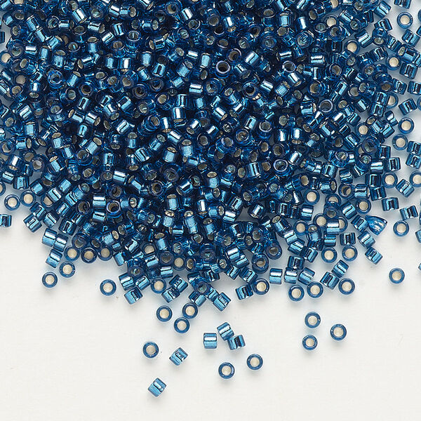 Seed bead, Delica®, glass, pkg/7.5g, #11 round, transparent silver-lined blue zircon (DB-0608). image number 0