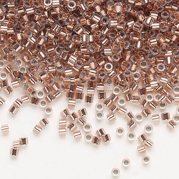 Seed bead, Delica®, glass, pkg/250g, #15 round, transparent copper-lined crystal clear (DBS-0037). image number 0