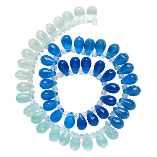 Bead, glass, transparent pale blue, blue and royal blue, 11x7mm top-drilled teardrop with irregular rondelles. Sold per 14-inch strand. image number 0
