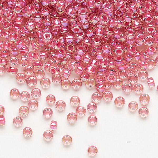 Seed bead, Miyuki, glass, pkg/250g, #8 rocaille, translucent hot pink-lined rainbow crystal clear (RR-355). image number 0