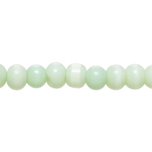 Bead, cat's eye glass (fiber optic glass), mint green, 7x5mm-8x6mm rondelle. Sold per 14-inch strand, approximately 65 beads.