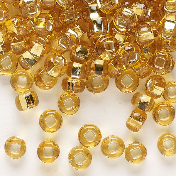 Seed bead, Preciosa Ornela, glass, transparent silver-lined topaz, #2 rocaille with square hole. Sold per 50-gram pkg. image number 0