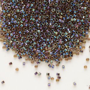 Seed bead, Delica®, glass, pkg/250g, #11 round, translucent root beer-lined rainbow light topaz (DB-0087).