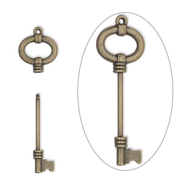 Focal, bead pin, antique brass-finished brass and "pewter" (zinc-based alloy), 67x24mm single-sided key with open oval and twist-off head, 30mm beadable length. Sold individually. image number 0