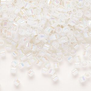 Seed bead, Delica®, glass, pkg/250g, #8 round, opaque rainbow opal (DBL-0222).