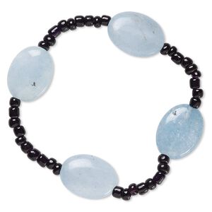 Bracelet, stretch, quartz (dyed) and glass, black and opaque blue, 3mm-5x4mm rondelle and 20x15mm-21x16mm puffed oval, 7-1/2 inches. Sold individually.