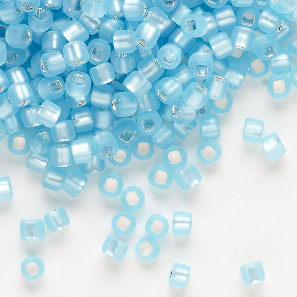 Seed bead, Dyna-Mites™, glass, silver-lined translucent matte light aqua, #6 round with square hole. Sold per 40-gram pkg. image number 0