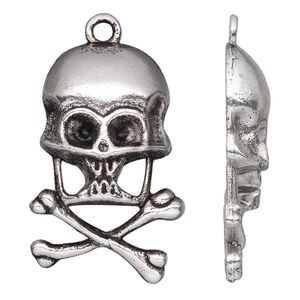 Focal, antique silver-plated "pewter" (zinc-based alloy), 35x23mm single-sided skull and crossbones. Sold per pkg of 10.
