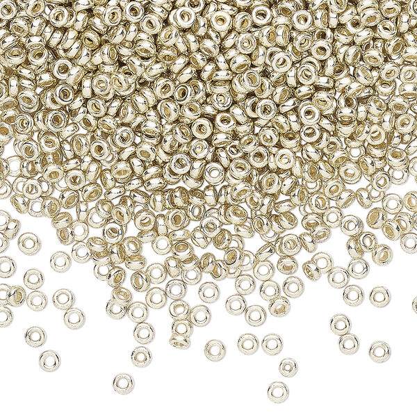 Seed bead, Miyuki, glass, pkg/250g, 2.2x1mm spacer rondelle, opaque brass-plated, (SPR2.2-4201). image number 0
