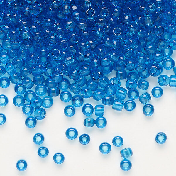 Seed bead, Dyna-Mites™, glass, transparent turquoise blue, #8 round. Sold per 1/2 kilogram pkg. image number 0