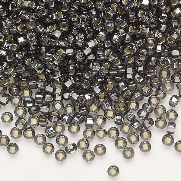 Seed bead, Preciosa Ornela Czech glass, pkg/500g, #8 rocaille, transparent silver-lined grey, (47010). image number 0