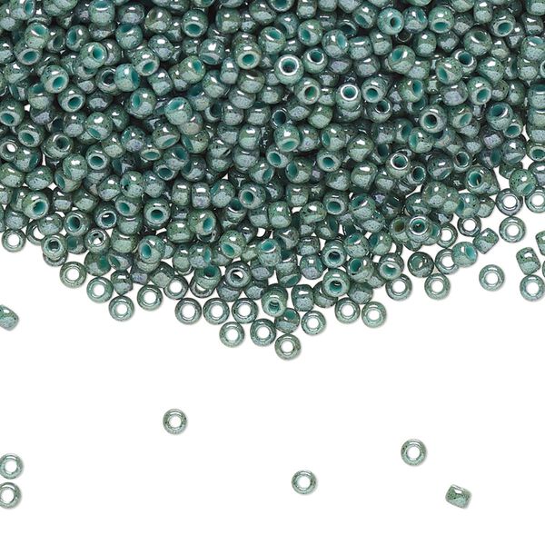 Seed bead, TOHO BEADS®, glass, pkg/50g, #11 round, opaque marbled turquoise blue (TR-11-1207). image number 0