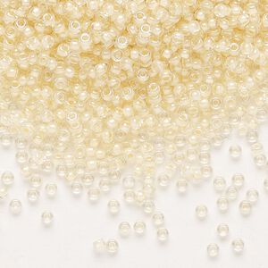 Seed bead, Miyuki, glass, pkg/250g, #11 rocaille, translucent ivory-lined luster crystal clear (RR-2215).