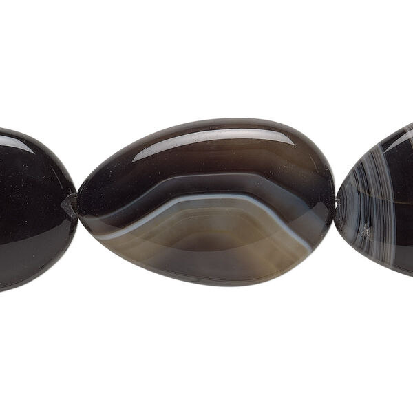 Bead, black agate (dyed), 26x17mm-32x23mm freeform, B grade, Mohs hardness 6-1/2 to 7. Sold per 8-inch strand, approximately 5 beads. image number 0