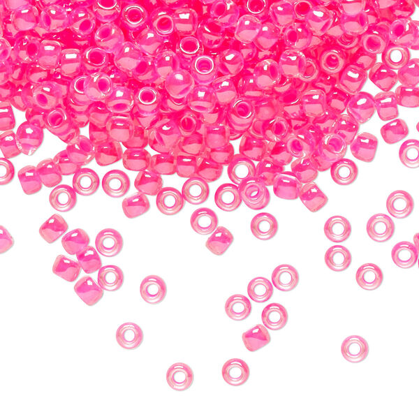 Seed bead, TOHO BEADS®, glass, pkg/50g, #8 round, translucent luminous inside color neon pink (TR-08-978). image number 0