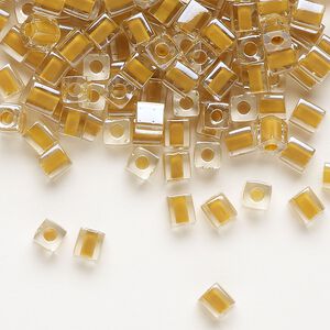 Seed bead, Miyuki, glass, pkg/25g, 3.5-3.7mm square, transparent tan inside dyed color clear (SB-244).