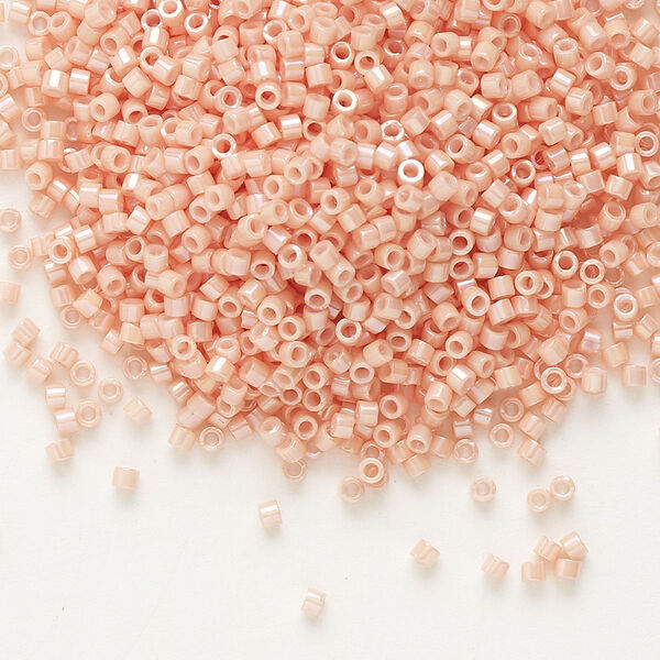 Seed bead, Delica®, glass, pkg/7.5g, #11 round, opaque rainbow gold luster salmon (DB-0207). image number 0