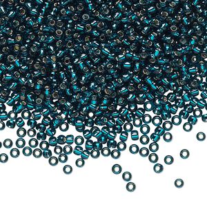 Seed bead, TOHO BEADS®, glass, pkg/50g, #11 round, transparent silver-lined teal (TR-11-27BD).