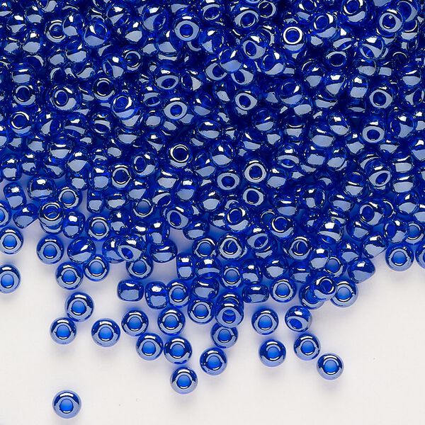 Seed bead, glass, pkg/50g, #8 rocaille, transparent luster cobalt blue. image number 0