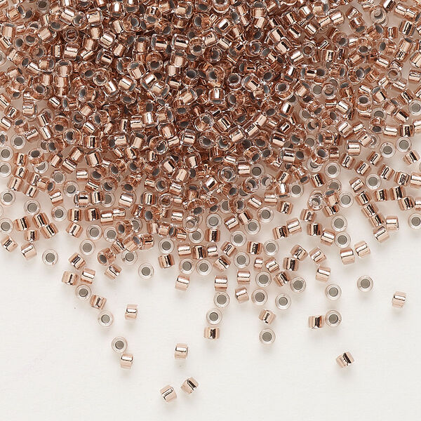 Seed bead, Delica®, glass, pkg/7.5g, #11 round, transparent copper-lined crystal clear (DB-0037). image number 0