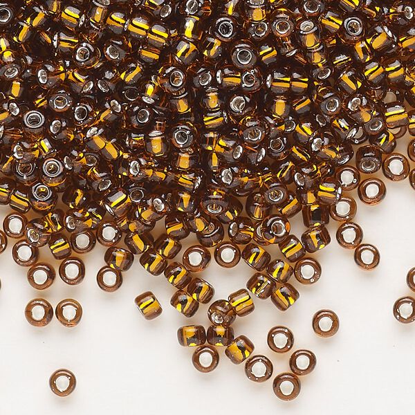 Seed bead, Dyna-Mites™, glass, silver-lined translucent root beer, #8 round. Sold per 1/2 kilogram pkg. image number 0