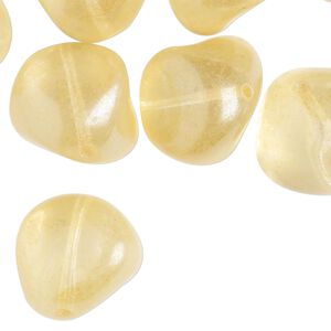 Bead, glass, translucent pale yellow, nugget. Sold per pkg of 10.