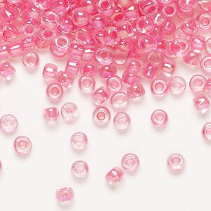 Seed bead, Dyna-Mites™, glass, transparent rainbow inside color hot pink, #6 round. Sold per 1/2 kilogram pkg.