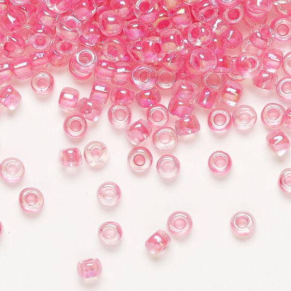 Seed bead, Dyna-Mites™, glass, transparent rainbow inside color hot pink, #6 round. Sold per 1/2 kilogram pkg. image number 0