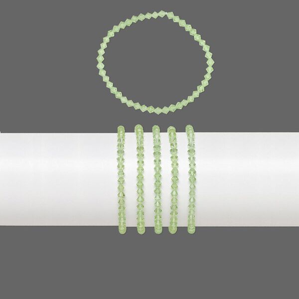 Bracelets, stretch, glass, transparent lime green, 4mm faceted bicone, 7 inches. Sold per pkg of 5. image number 0