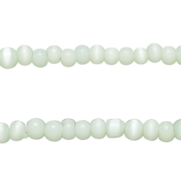 Bead, cat's eye glass (fiber optic glass), sea green, 4x3mm-5x4mm uneven round. Sold per pkg of (2) 14-inch strands, approximately 200 beads. image number 0