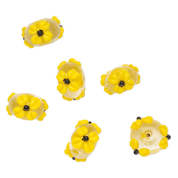 Bead, lampworked glass 1pkg6, clear / opaque yellow / black, 18x11mm rondelle with flowers. image number 0