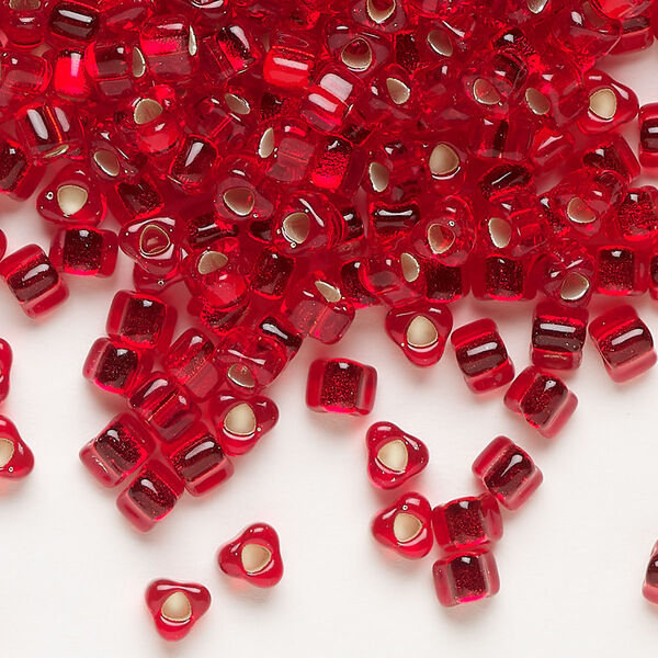 Seed bead, Miyuki, glass, silver-lined translucent dark red, (TR1809), #5 triangle. Sold per 250-gram pkg. image number 0