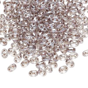 Seed bead, Preciosa Twin™ Czech glass, pkg/250g, 5x2.5mm oval, transparent mocha terra color-lined clear, (38618).