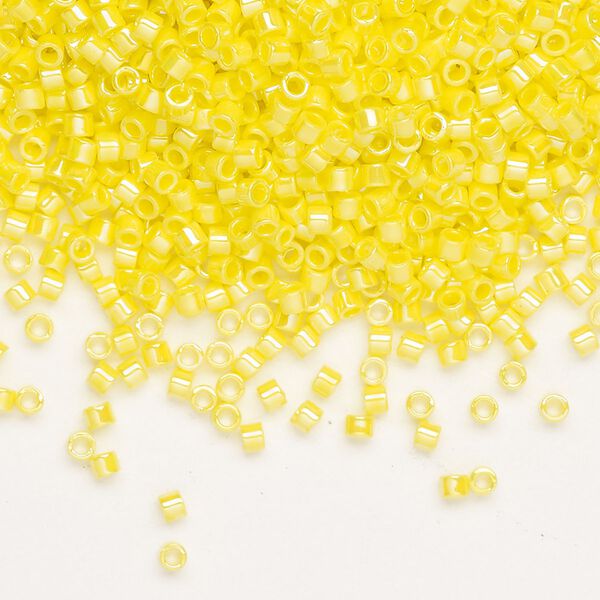 Seed bead, Delica®, glass, pkg/7.5g, #10 round, opaque rainbow yellow (DBM-0160). image number 0
