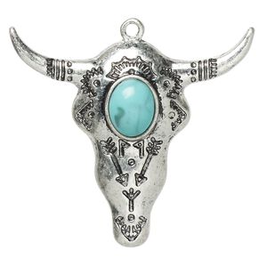 Focal, "turquoise" (resin) (imitation) and antiqued "pewter" (zinc-based alloy), blue, 43.5x39mm single-sided steer skull with tribal design. Sold individually.