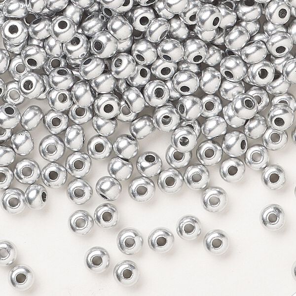 Seed bead, Preciosa Ornela Czech glass, pkg/50g, #6 rocaille, opaque soft silver metallic alabaster, (01700). image number 0