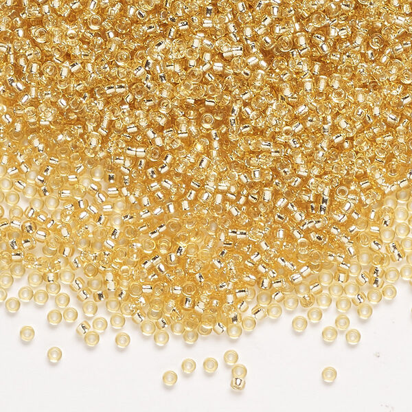 Seed bead, Miyuki, glass, pkg/35g, #15 rocaille, transparent silver-lined gold (RR-3). image number 0