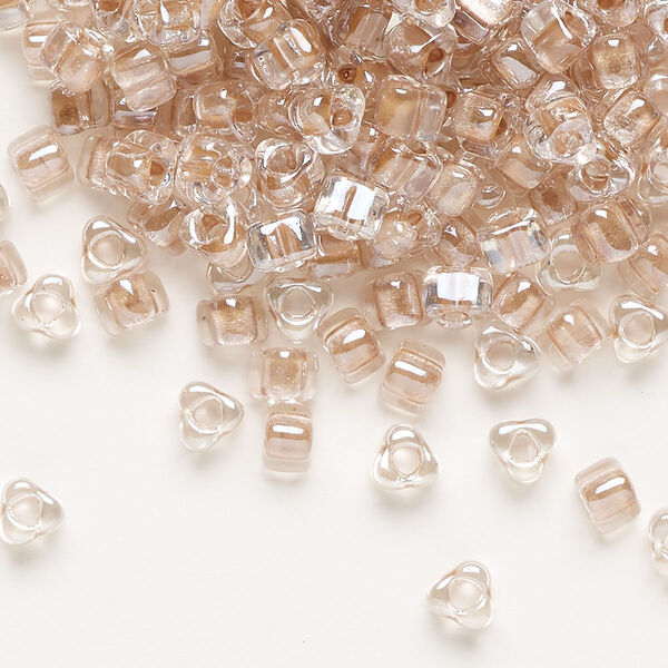Seed bead, Miyuki, glass, transparent clear color-lined copper, (TR1129), #5 triangle. Sold per 25-gram pkg. image number 0