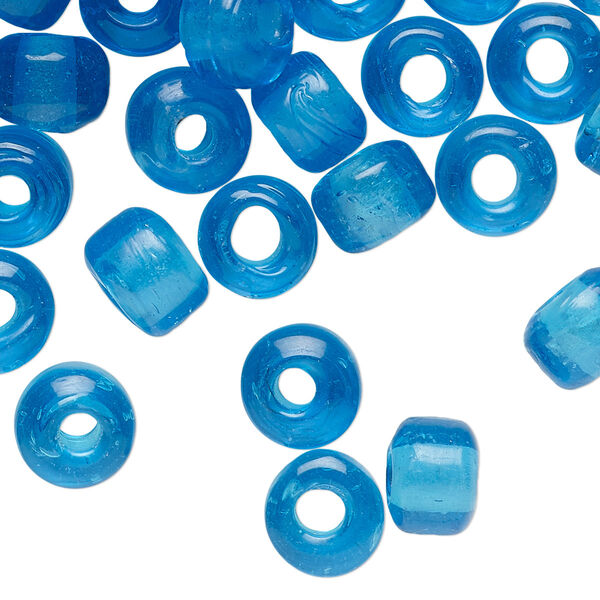 Bead, glass, transparent blue, 9x7mm crow. Sold per pkg of 100. image number 0