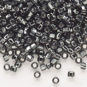 Seed bead, Dyna-Mites™, glass, silver-lined translucent gunmetal, #6 round with square hole. Sold per 1/2 kilogram pkg.