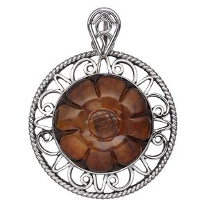 Pendant, amber (heated) and antiqued sterling silver, 38mm filigree round with 25mm carved flower. Sold individually.