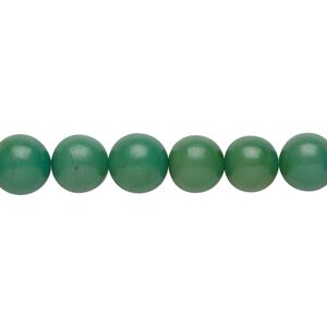 Bead, nut (dyed), green, 7-9mm hand-cut round. Sold per 15-1/2" to 16" strand.