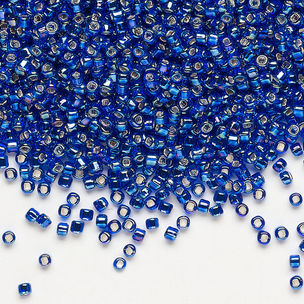 Seed bead, Dyna-Mites™, glass, pkg/1/2kg, #11 round, translucent silver-lined rainbow cobalt blue, (74R:SR 11/0 SR). image number 0