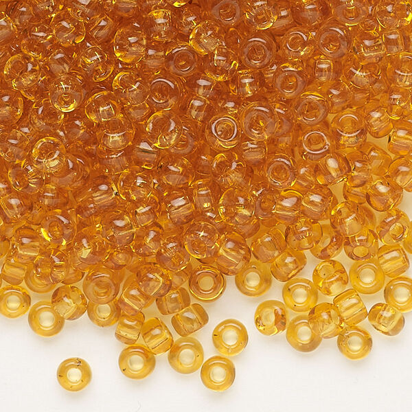 Seed bead, Dyna-Mites™, glass, transparent amber, #6 round. Sold per 1/2 kilogram pkg. image number 0