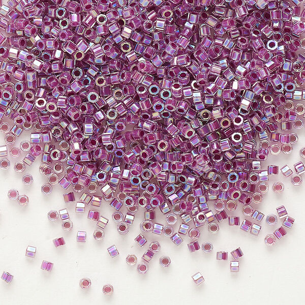 Seed bead, Delica®, glass, pkg/7.5g, #11 cut, translucent raspberry-lined rainbow crystal clear (DBC-0056). image number 0
